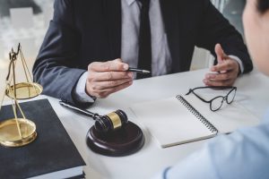 A solicitor explaining the holiday accident claims process to a client.