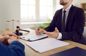 A solicitor and their client discussing making a historical sexual abuse claim.